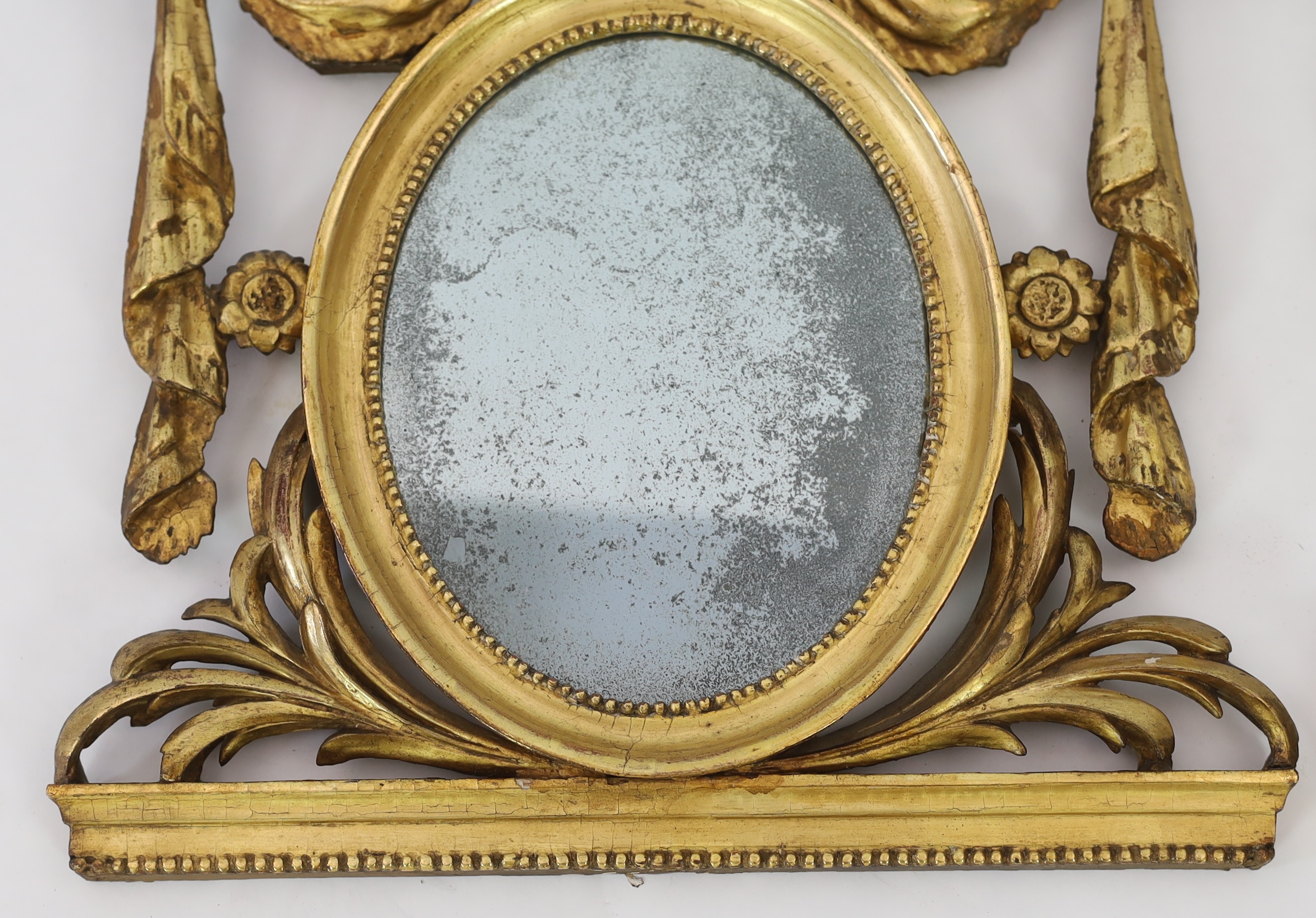 A pair of late 18th century Adam period giltwood wall mirrors